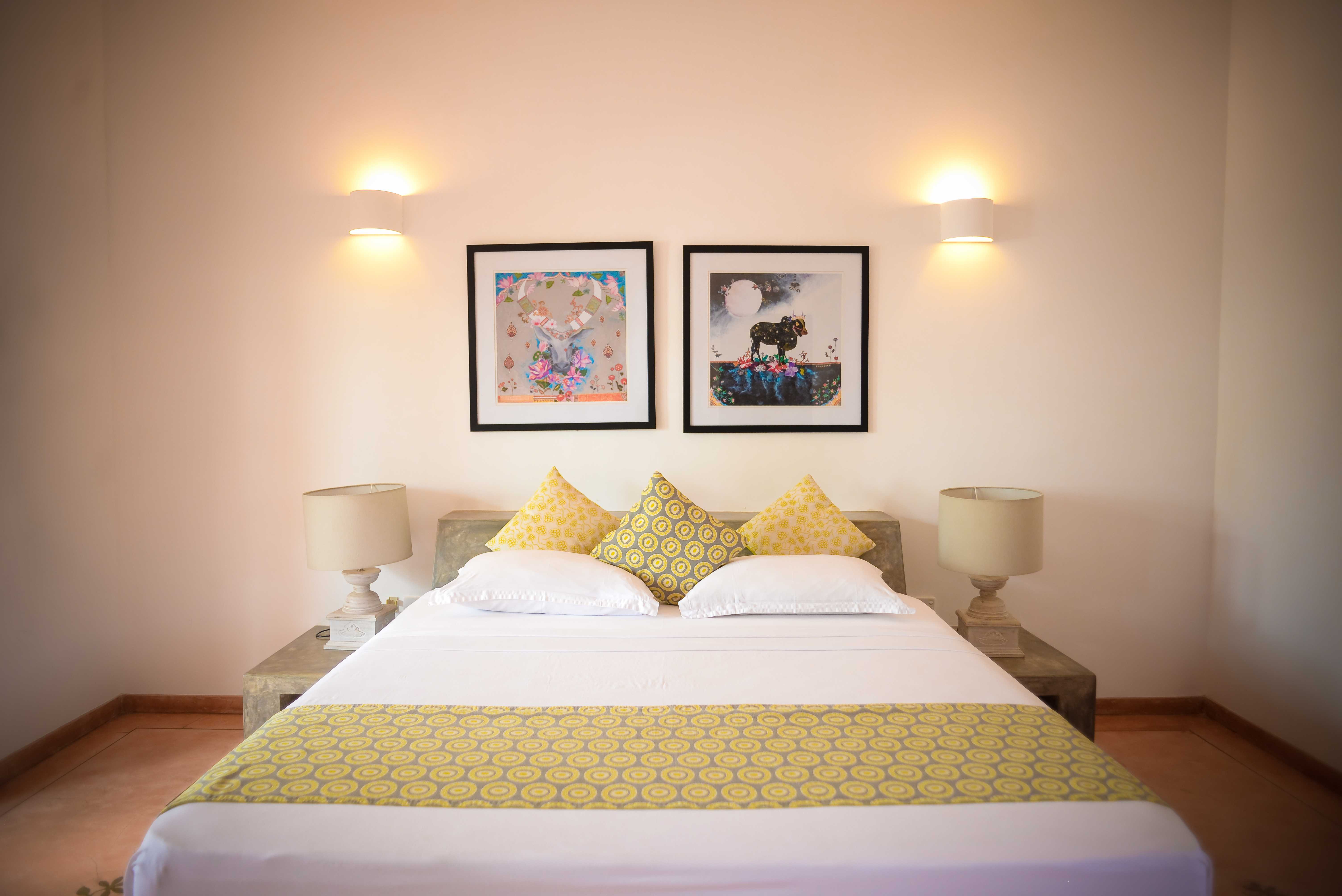 Deluxe Double Room — king bed and balcony